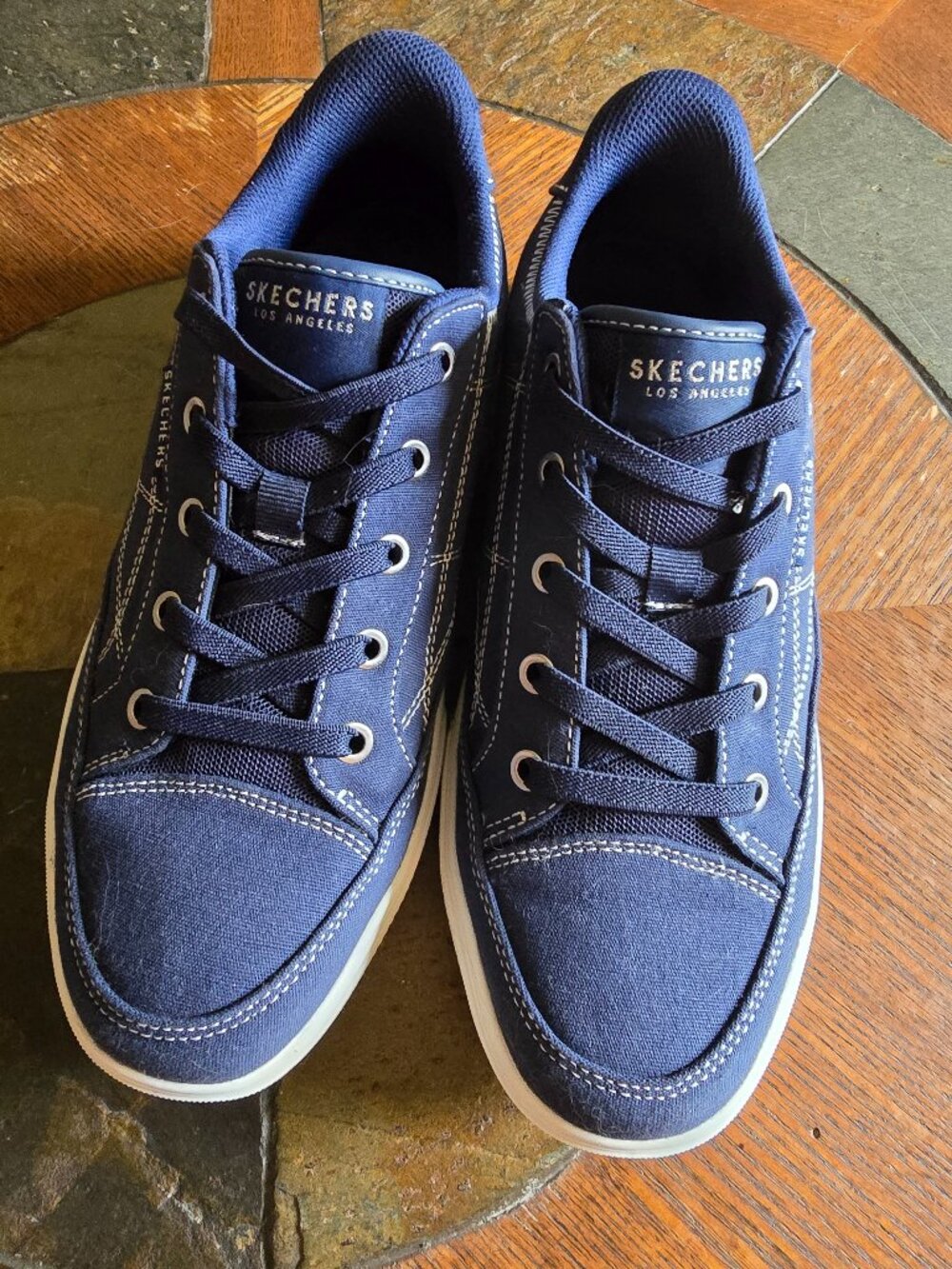 NWOT Women's Size 8.5 Navy Slip-on Skechers